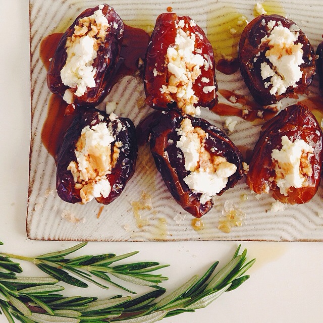 GOAT CHEESE STUFFED DATES WITH POMEGRANATE MOLASSES & SMOKED SALT.