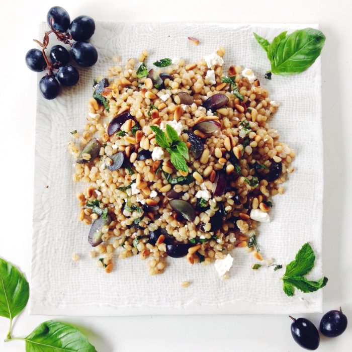 TOASTED WHEAT BERRY SALAD WITH GRAPES, FETA, MINT AND BASIL.