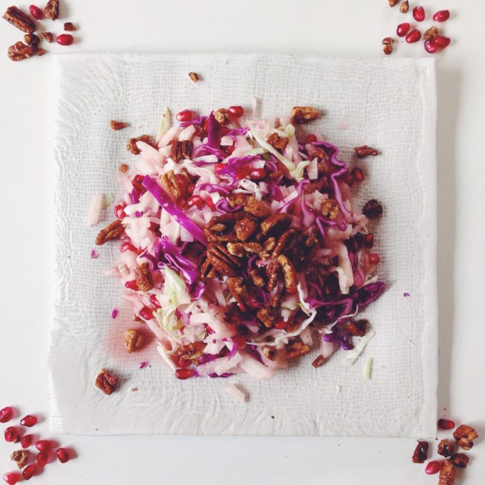 JICAMA CABBAGE SALAD WITH SPICY MAPLE PECANS AND POMEGRANATE.