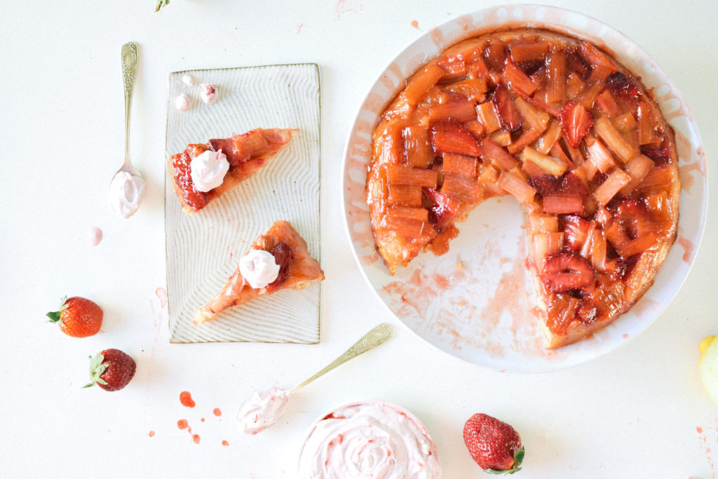 STRAWBERRY RHUBARB UPSIDE DOWN CAKE WITH STRAWBERRY COCONUT WHIPPED CREAM.