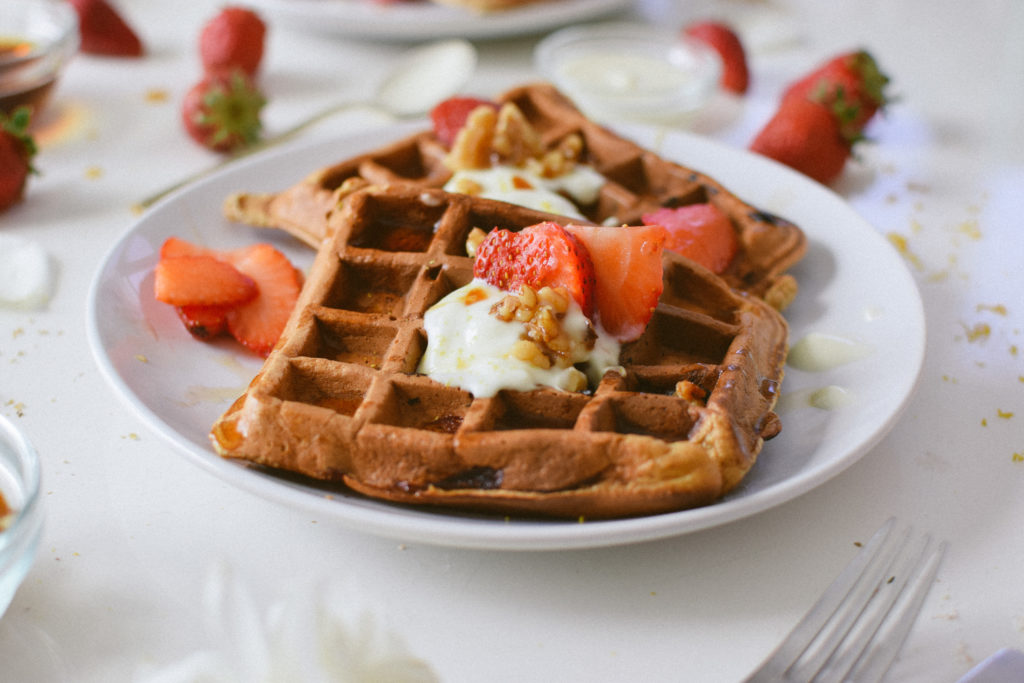 STRAWBERRY ROSEWATER WAFFLES WITH MAPLE TOASTED WALNUTS.
