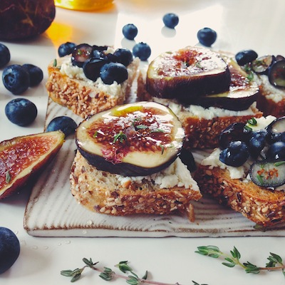 GOAT CHEESE TARTINES TWO WAYS: BLUEBERRY ROSEMARY AND FIG & THYME.
