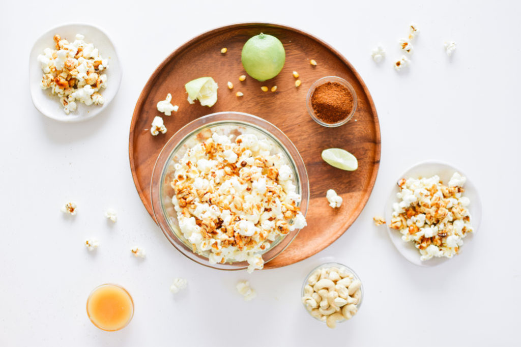CHIPOTLE LIME POPCORN WITH SWEET & SPICY CASHEW CLUSTERS.
