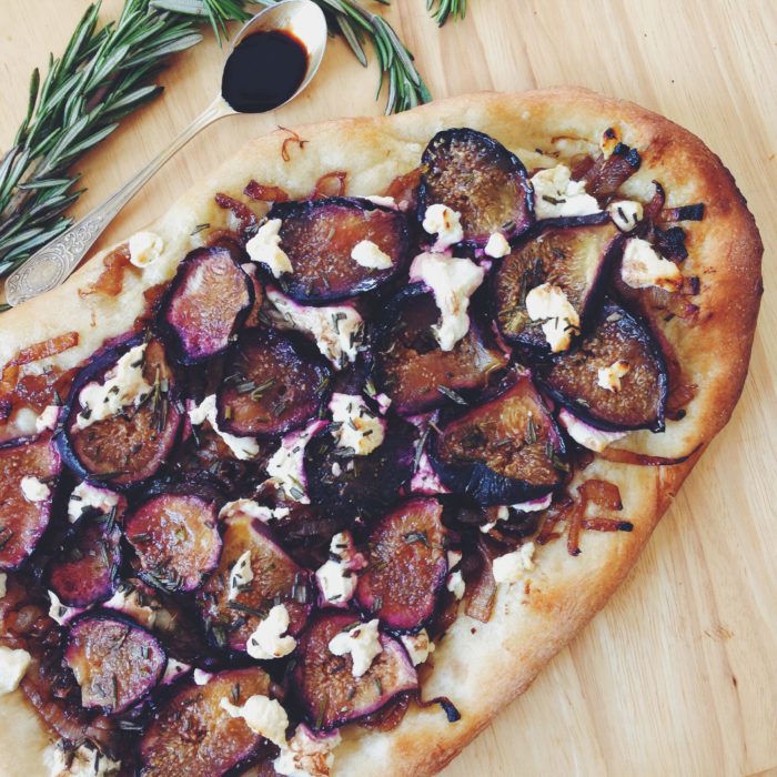 ROASTED FIG PIZZA WITH TRUFFLED CHÈVRE & BALSAMIC CARAMELIZED ONION.