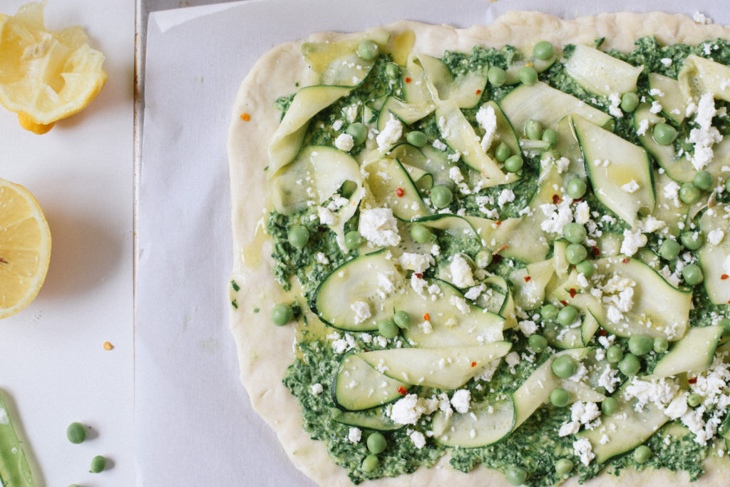 Green Goddess Pesto Pizza With Fresh Peas & Feta. 