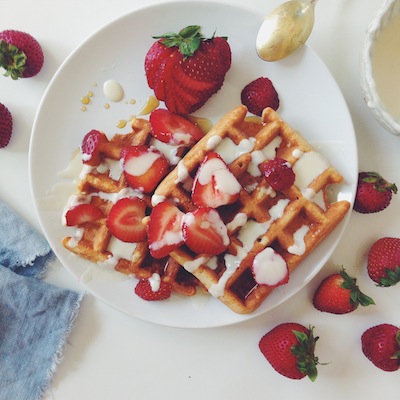 GLUTEN-FREE COCONUT WAFFLES WITH LEMON MAPLE WHIPPED CHÈVRE & STRAWBERRIES.