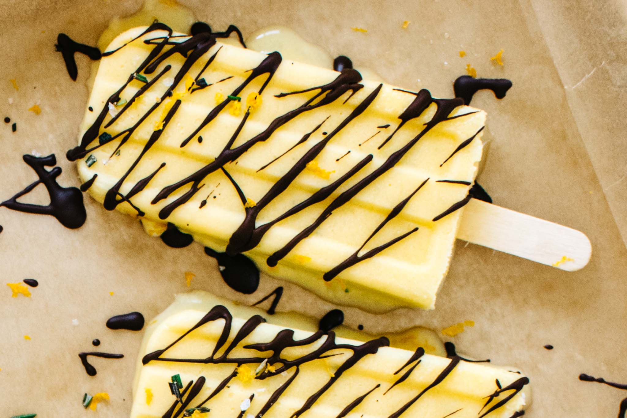 Sweet Orange & Rosemary Creamsicles with Salty Chocolate Drizzle from Kale & Caramel: Recipes for Body, Heart, and Table