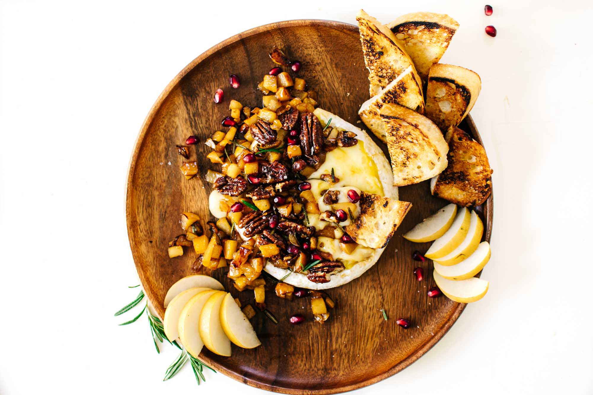 MAPLE-ROSEMARY PEAR & PECAN BAKED BRIE.