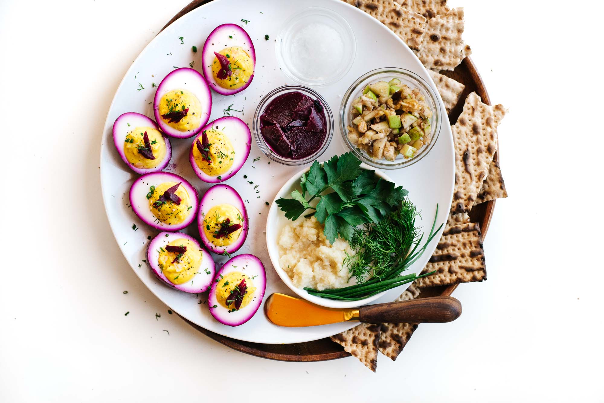 vegetarian-passover-seder-plate-with-beet-pickled-deviled-eggs-kale